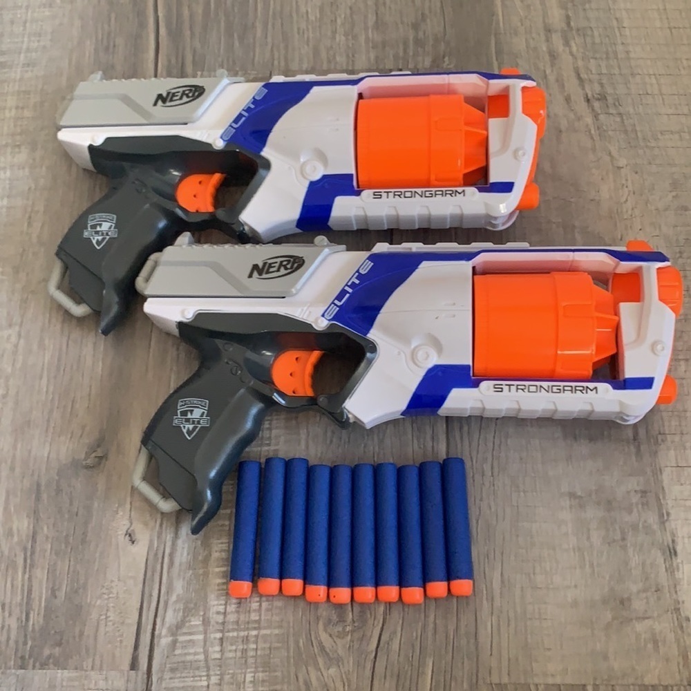 Two nerf elite strong arm toy guns with ten pellets included (used)